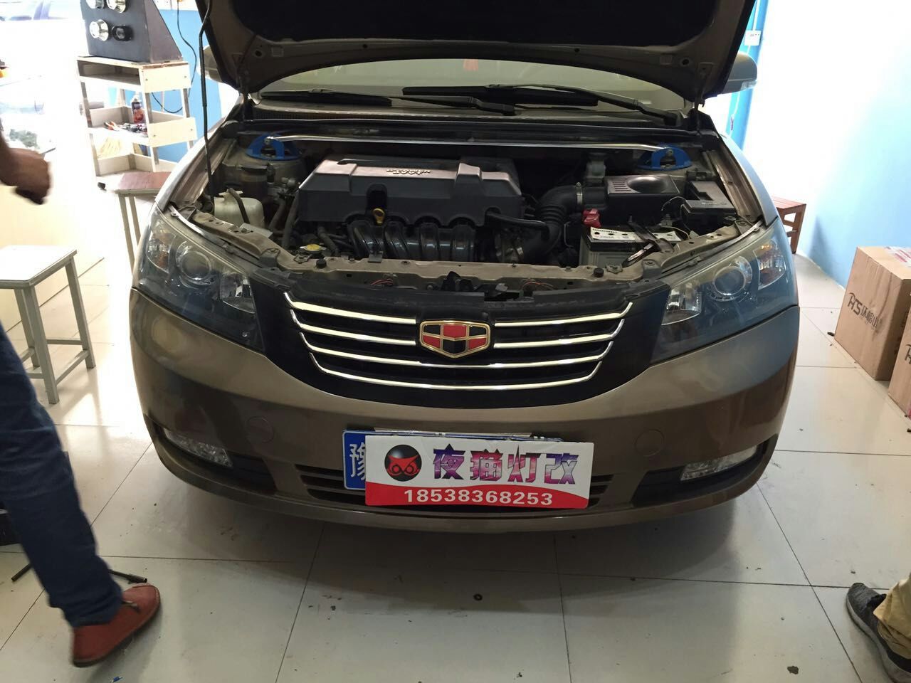 吉利帝豪ec718灯光调整图,帝豪ec718汽车大灯近灯怎么调高度