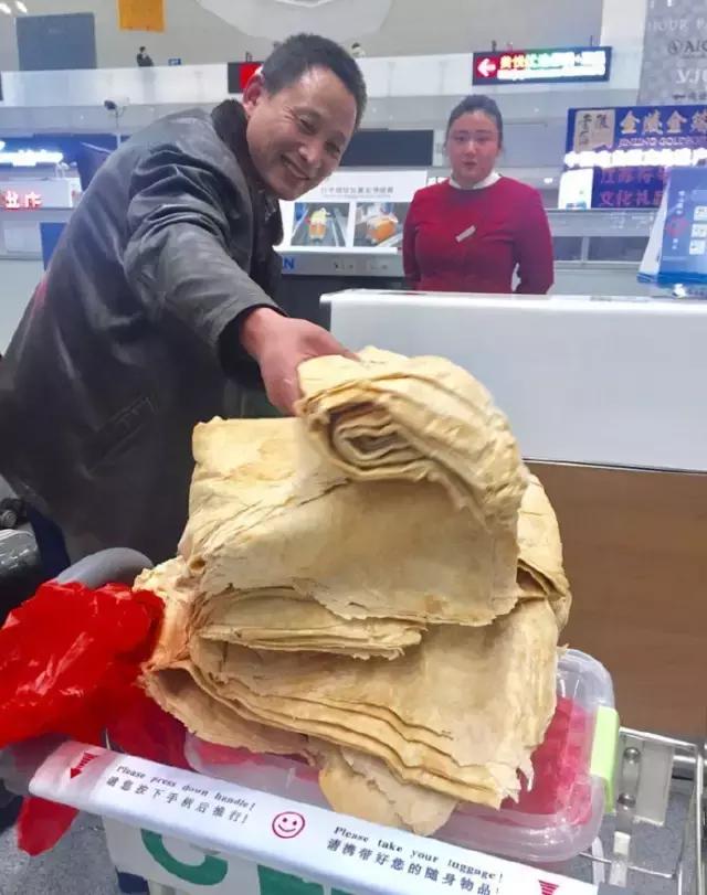 我妈让我带60斤大米去上班？