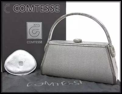 英国女王背双肩包,英国女王的爱马仕包包