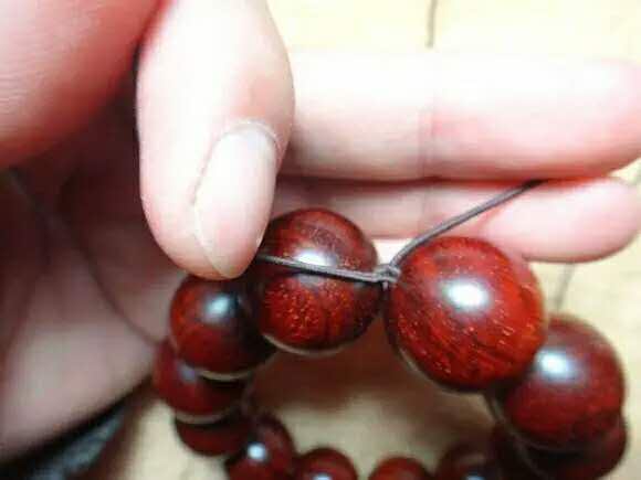 紫檀佛塔打结,小叶紫檀手串侧挂佛头打结方法