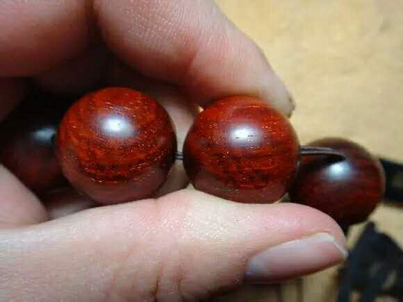 紫檀佛塔打结,小叶紫檀手串侧挂佛头打结方法