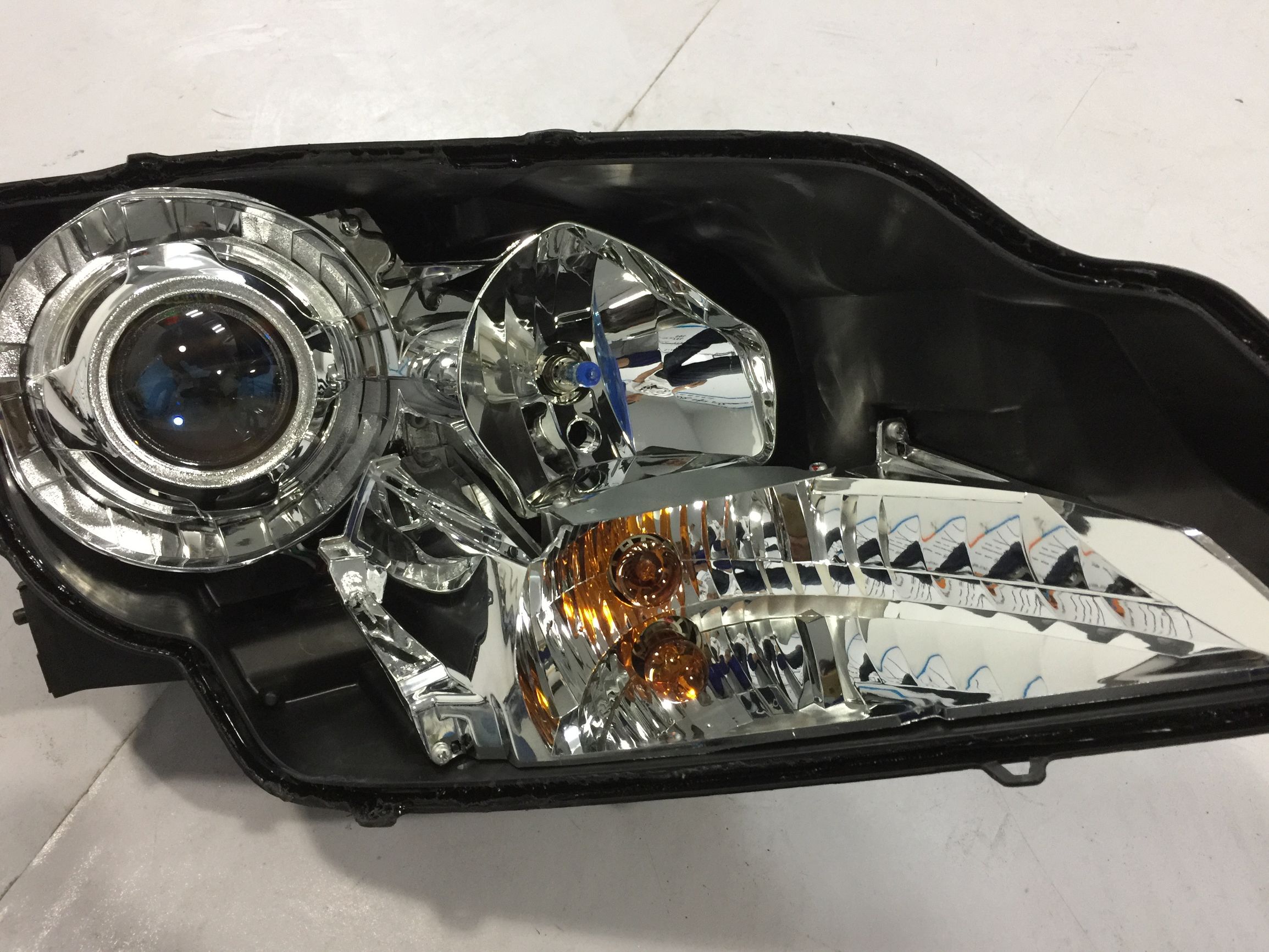 新款别克英朗改装双光透镜,别克全新英朗车灯更换