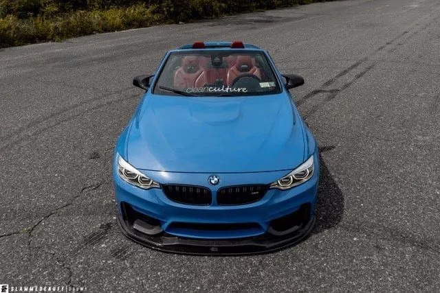 改装的宝马m4直接趴在地上了,普通的宝马m4可以开敞篷