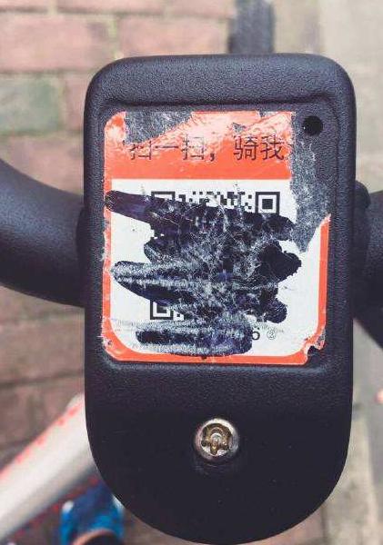 共享单车毁坏二维码私用,共享单车二维码均被涂划