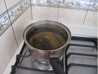 煮饭忘记放水怎么补救,煮饭锅烧糊了怎么清洗