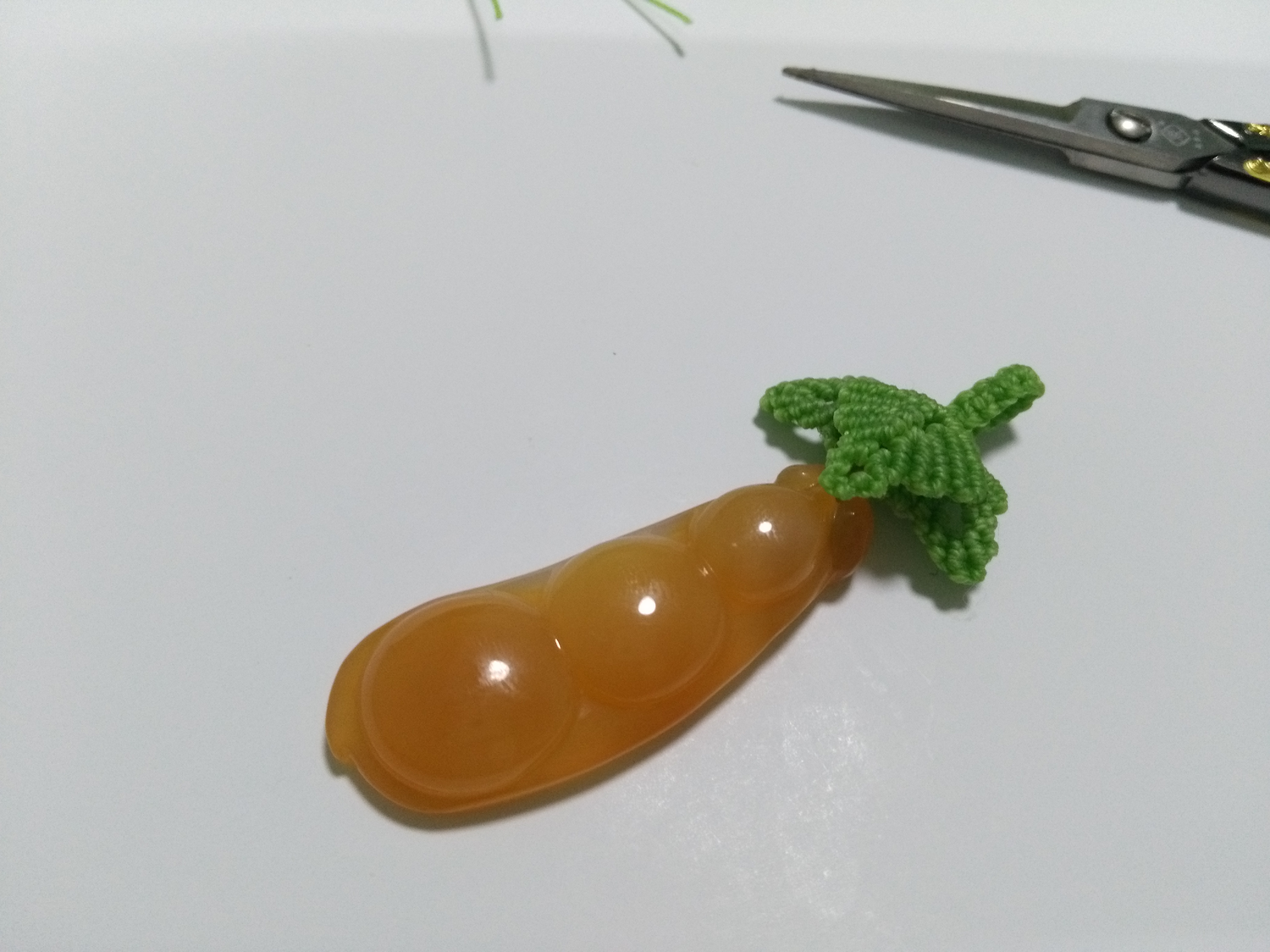 玛瑙豆子编手机吊坠法教程,玉豌豆吊坠怎么编绳