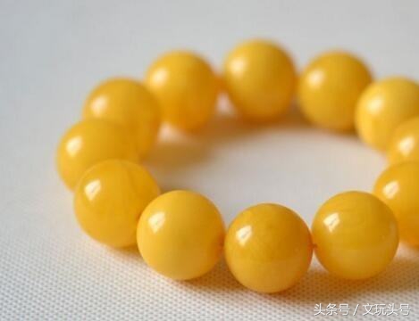 好蜜蜡的成色,柠檬黄蜜蜡时间长了是什么颜色