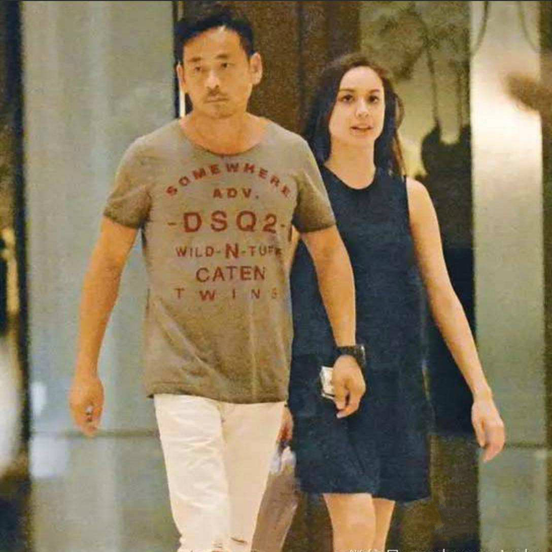 身价百亿的周焯华,周焯华真人照片