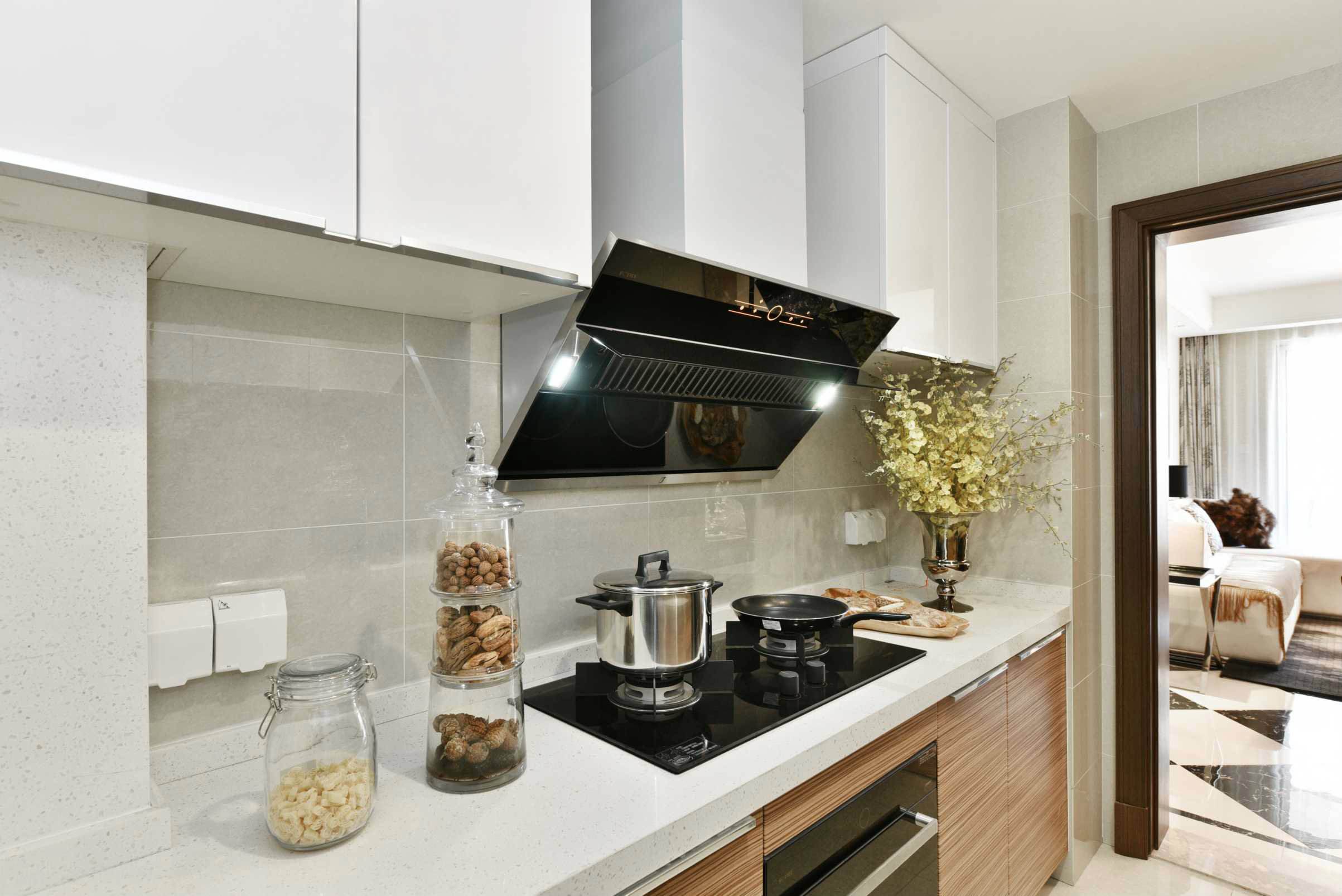 顶吸或侧吸的油烟机哪种好,侧吸和顶吸油烟机哪种好用