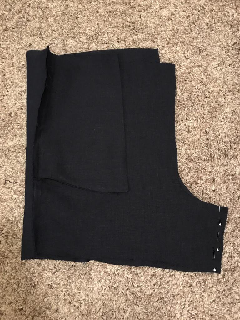 短裤一根布腰带的系法,短裤的一条裤带怎么系