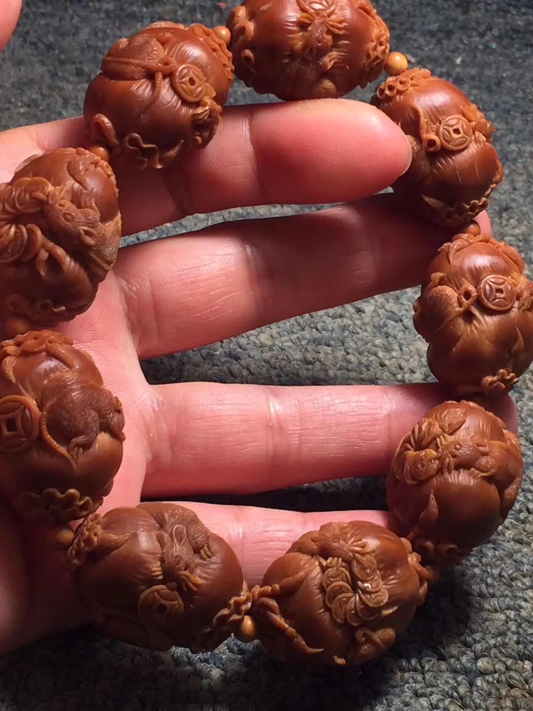 橄榄核怎么盘及保养,新入手的橄榄核盘玩步骤