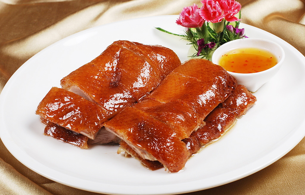 鹅、鹅、鹅，曲项向天歌，鹅头浮卤水，鹅掌躺干锅