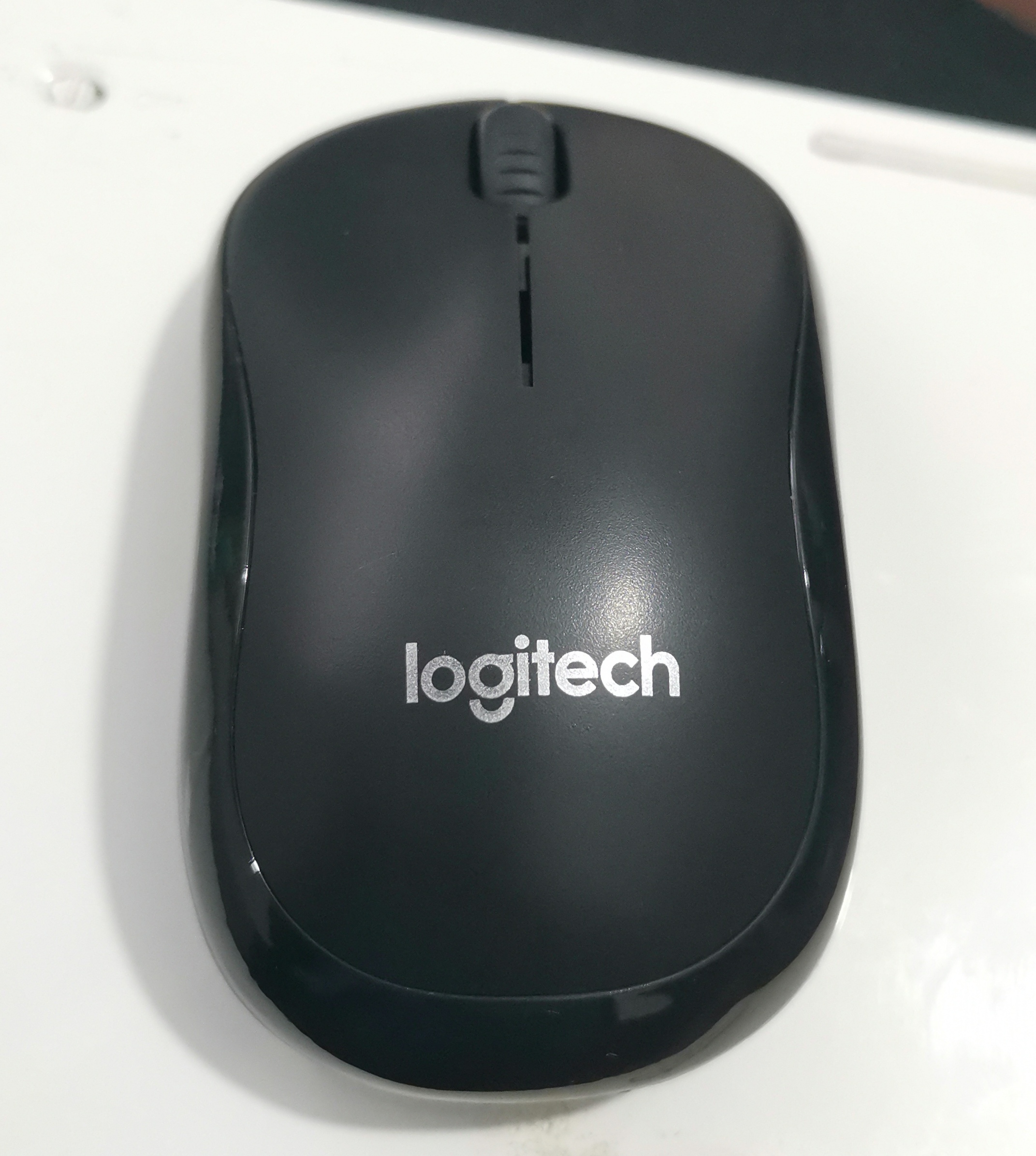 拼多多买罗技m221,拼多多有人卖杂牌机如何举报