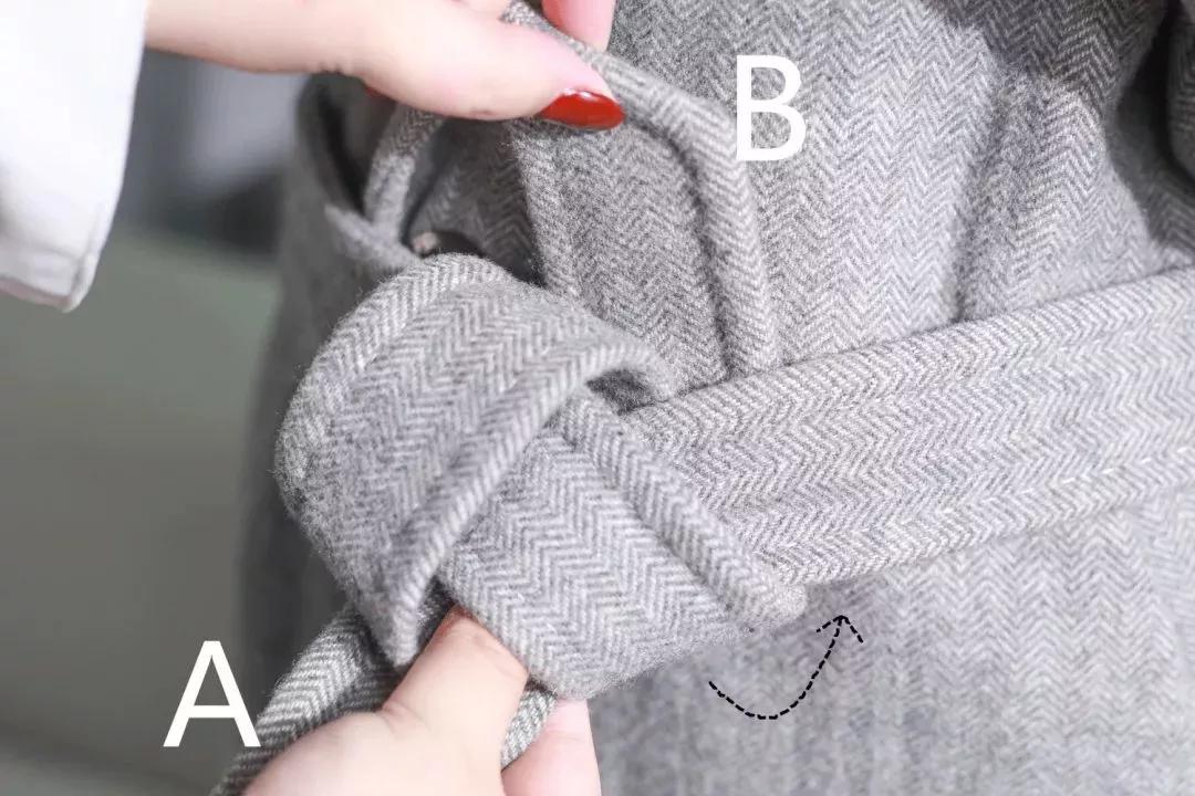 风衣后面的腰带怎么系,带扣风衣腰带后面系法