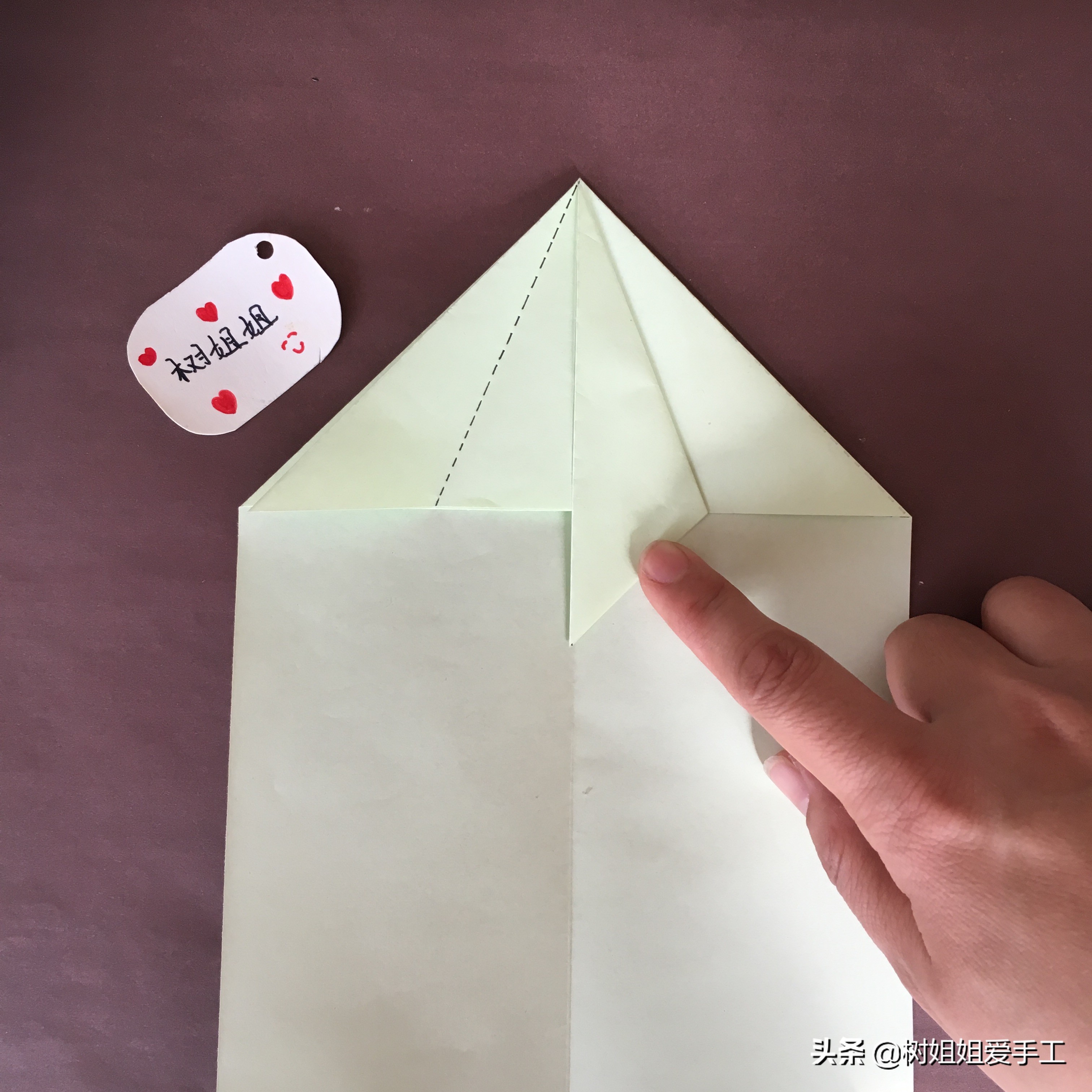 拖尾孔雀的三角插教程,折纸孔雀尾巴怎么折