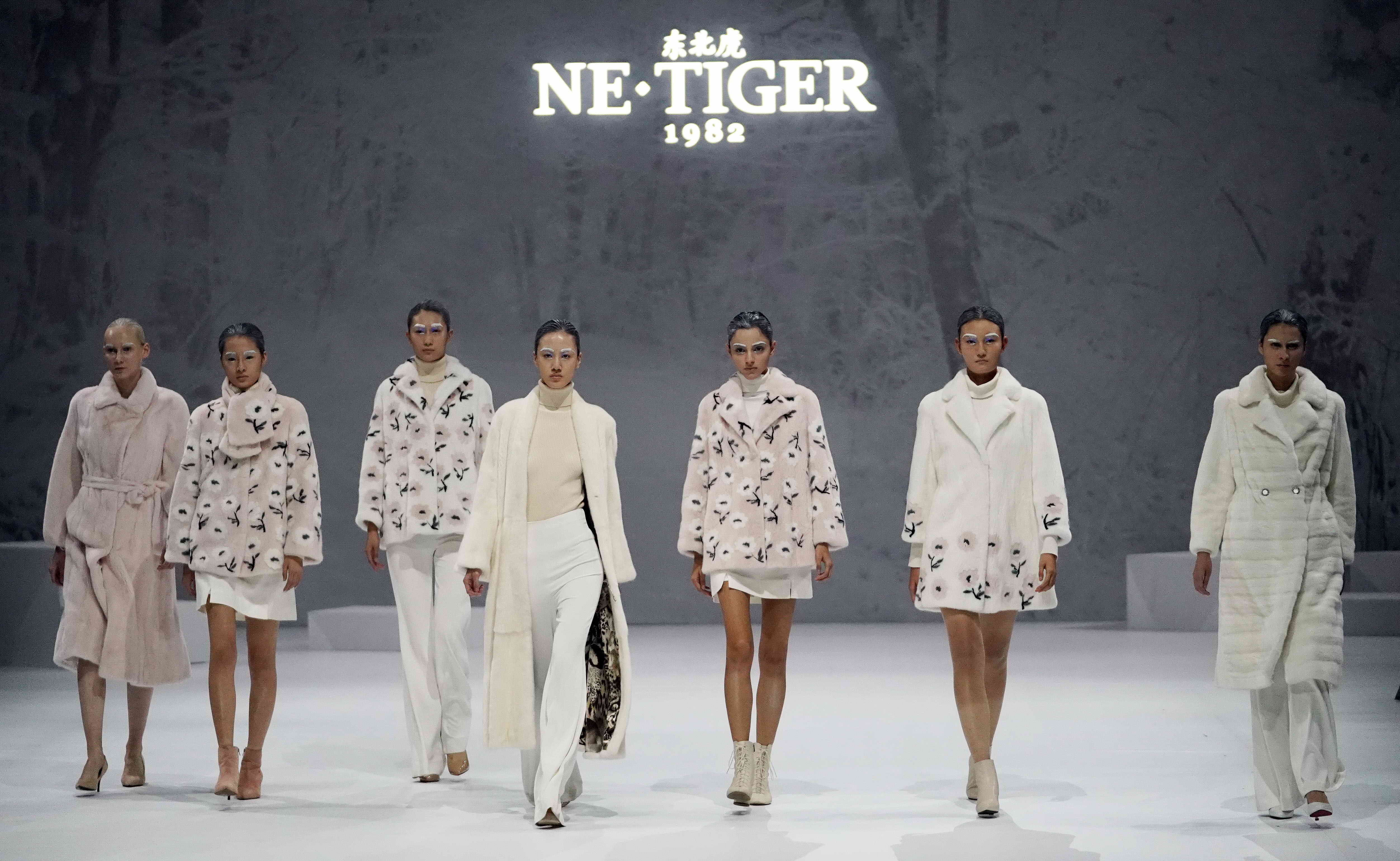 netiger高定晚礼服,netiger东北虎品牌logo