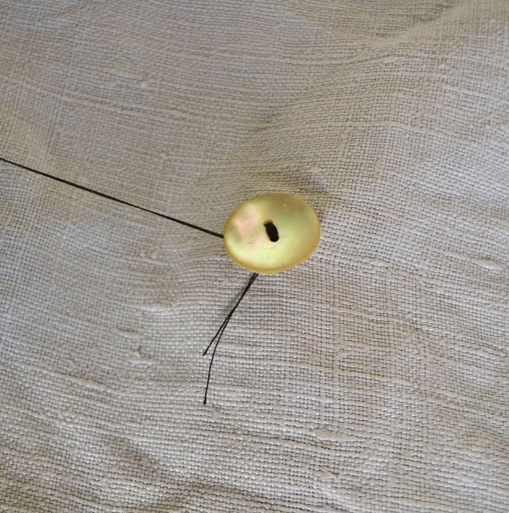 衣服扣纽扣办法,衣服纽扣扣错了怎么取出来