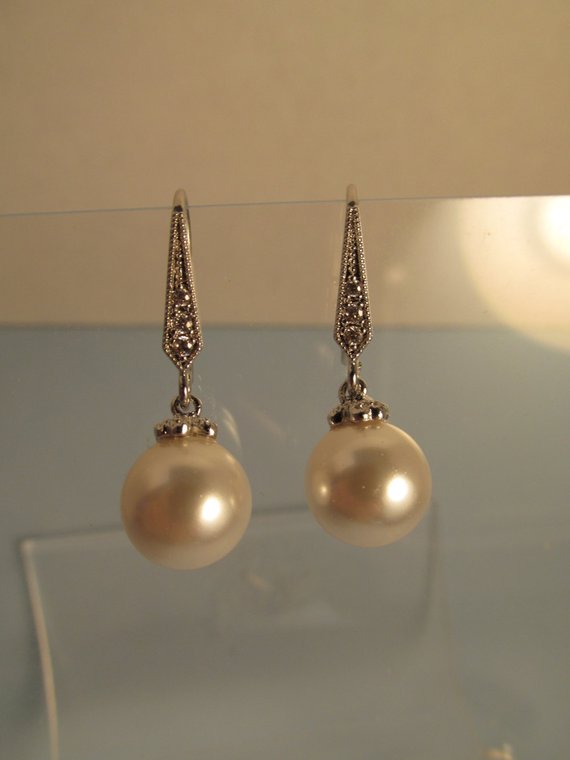 时尚之不可思议，有一种假珍珠抢走了真珍珠的半壁江山