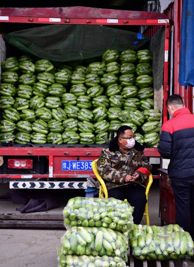 郑州万邦物流配送中心,郑州万邦蔬菜市场搬运工