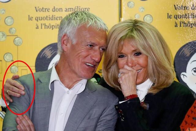 布丽吉特穿着一身黑色,布丽吉特一身浅蓝色的套装出镜