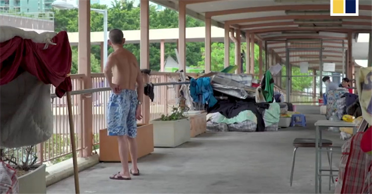 香港住笼屋的人有没有安家在大陆,在香港住笼屋的人有多少