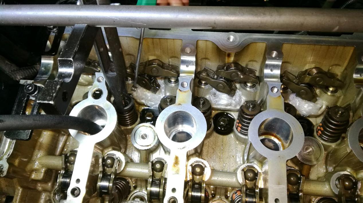 气门油封和活塞环烧机油区别,怎样区分气门油封和活塞环烧机油