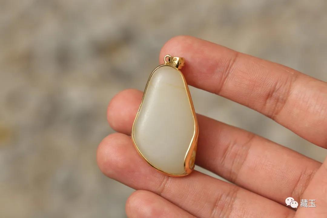 和田玉籽料金包玉,和田玉籽料金包银天然牌子