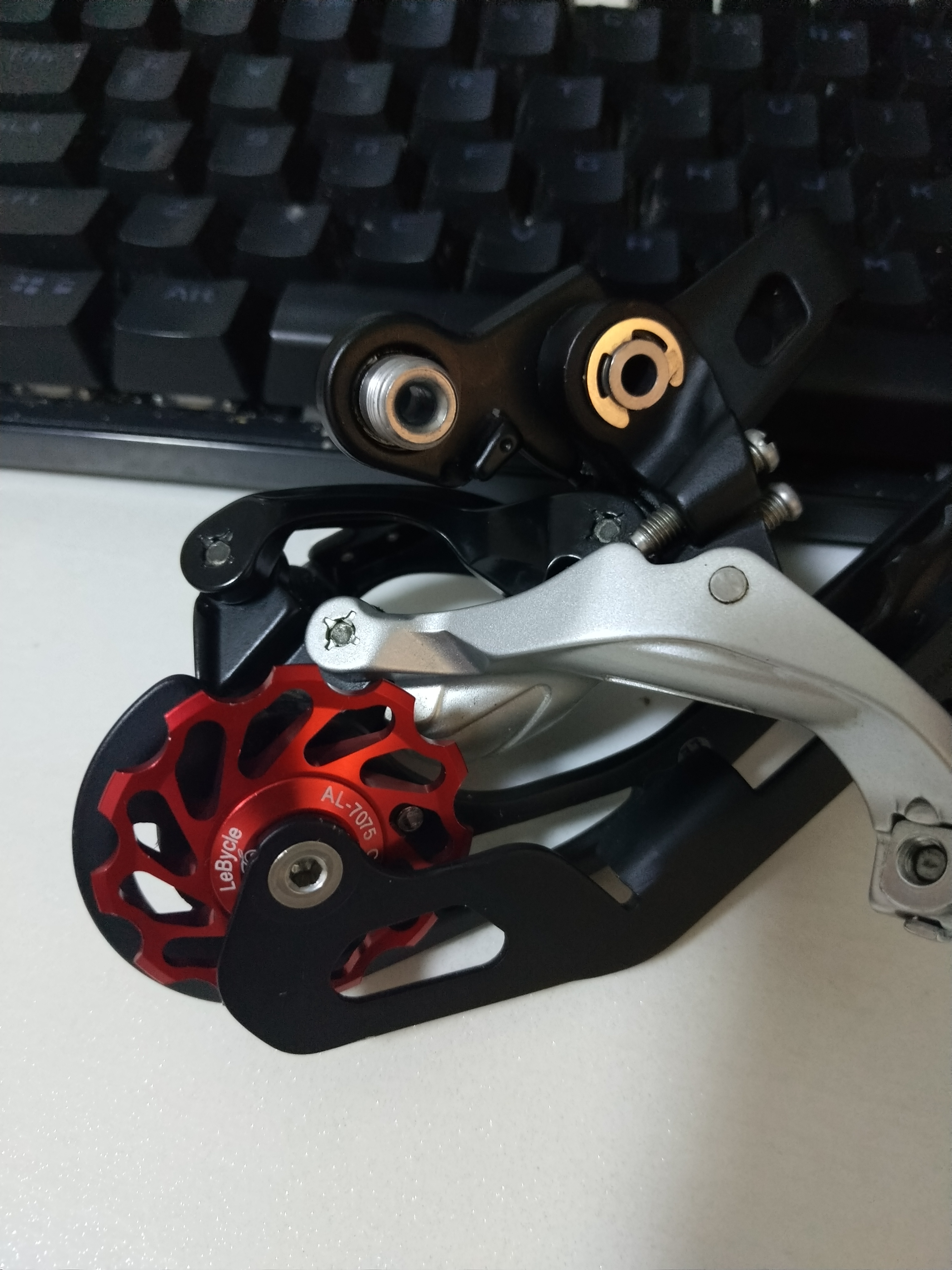 单车后拨滑丝修复,单车后拨掉了怎么修