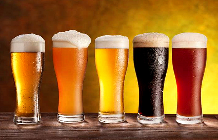市场上啤酒是白啤还是黄啤,白啤和黑啤和普通啤酒的区别