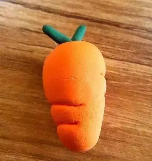 胡萝卜手工作品幼儿园简单教程,手工布艺胡萝卜制作过程图片