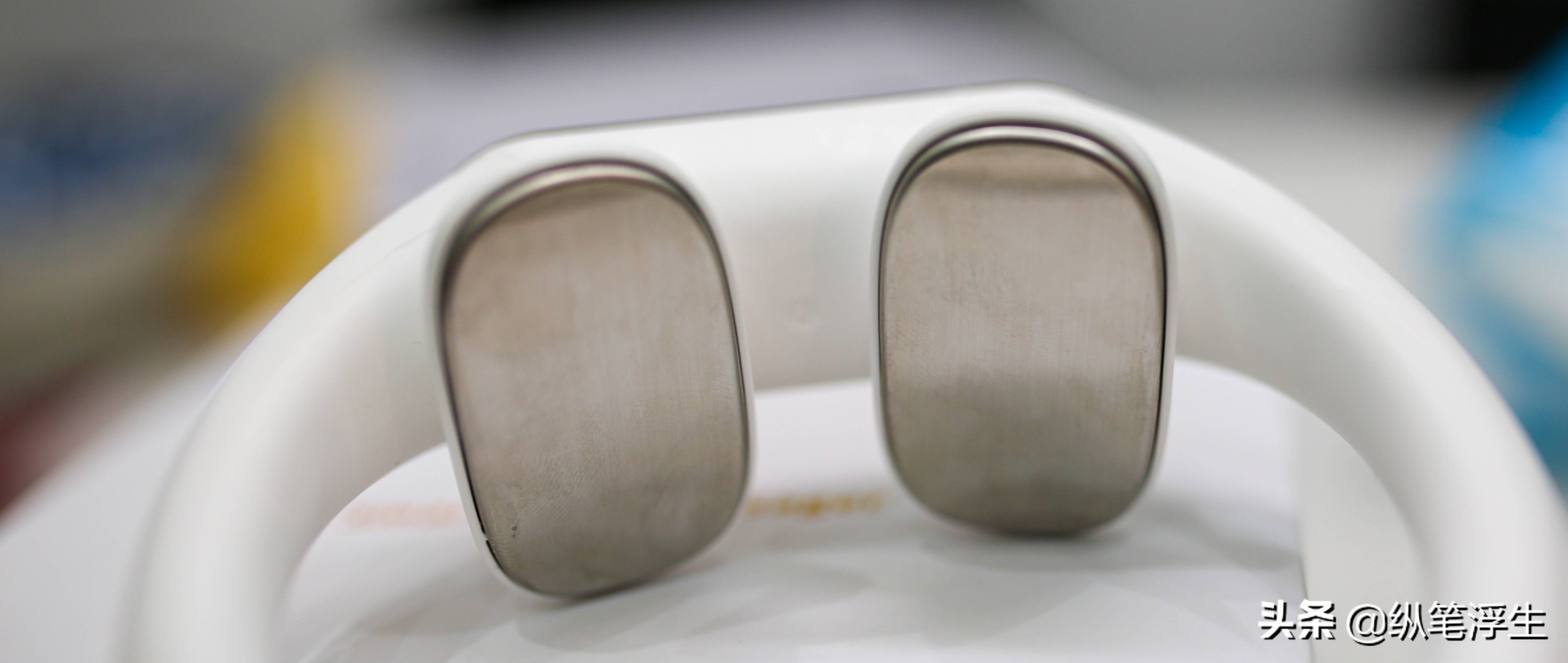 电脉冲、热敷按摩*管双**齐下：人与物AM2011颈椎按摩器测评