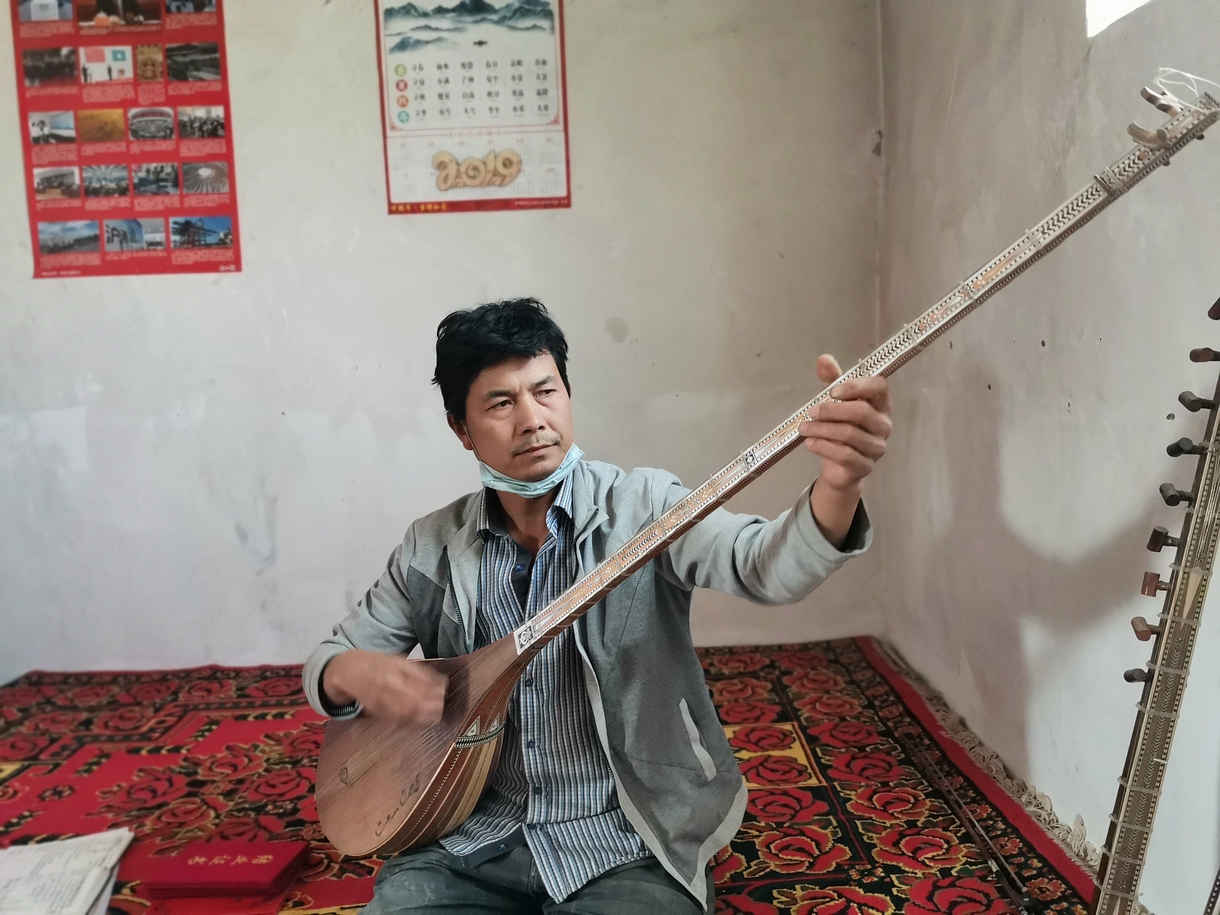 新疆选手塔依尔,塔伊尔民族乐器大全