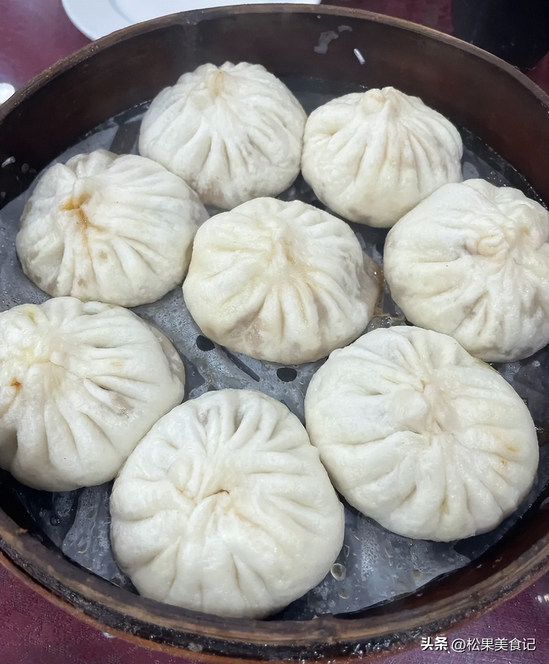 狗不理包子50元一笼,一笼包子5个20元