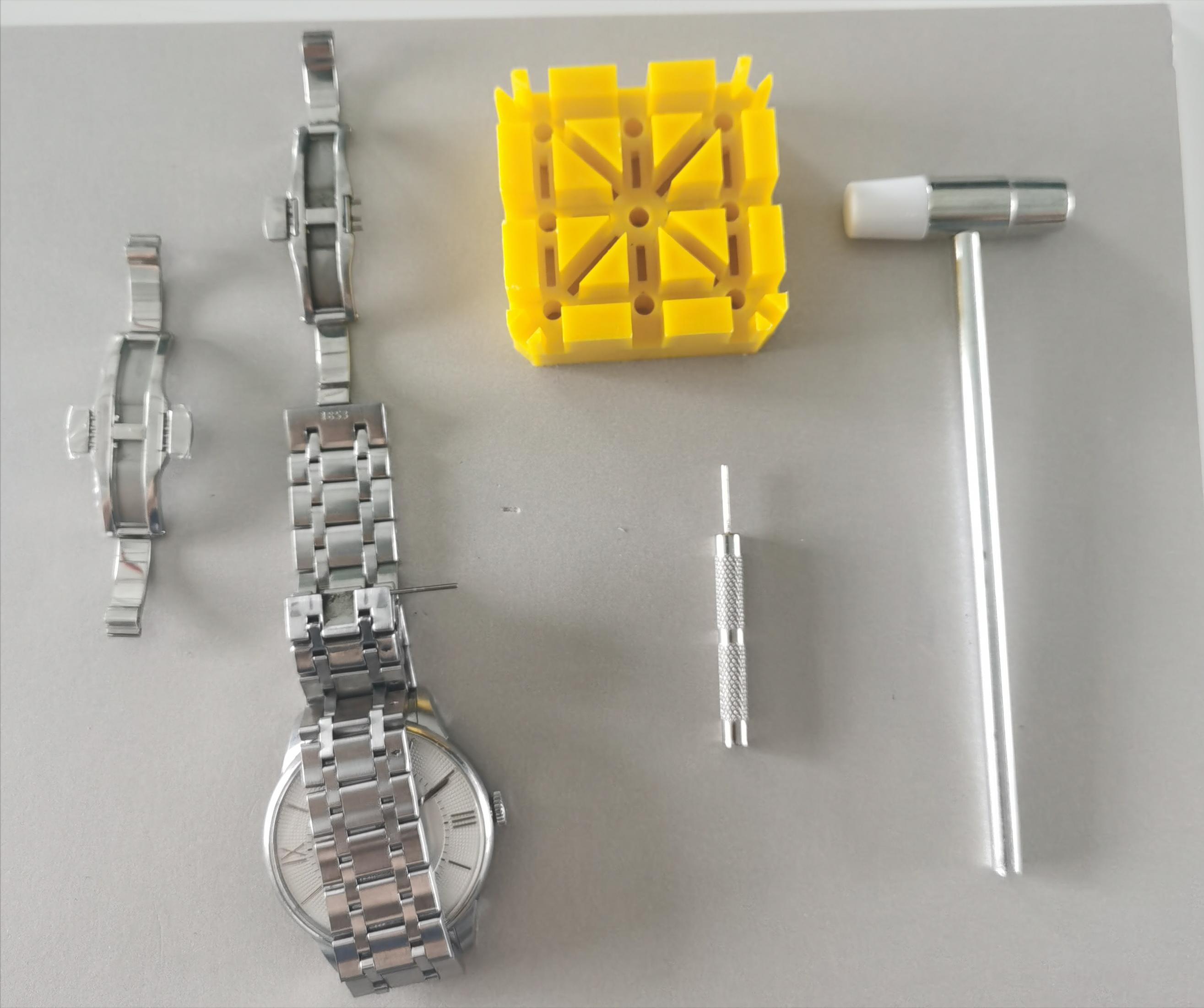 天梭表不锈钢带卡扣坏了,瑞士天梭表卡扣扣不上怎么弄