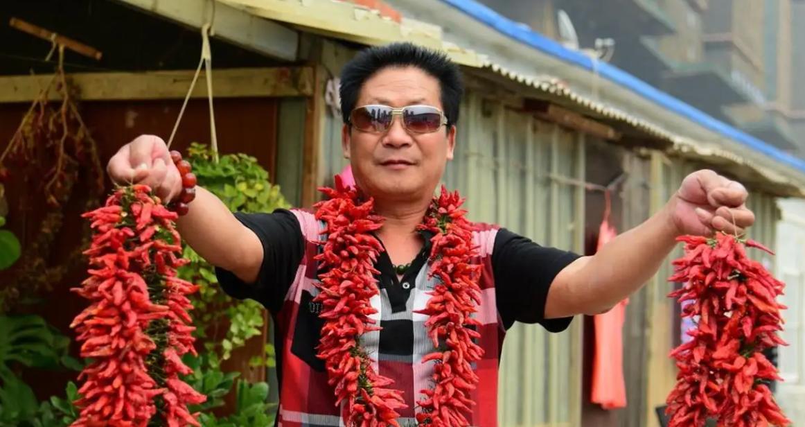 中国辣王李永志喝白酒,辣王李永志吃辣椒肠胃受得了吗