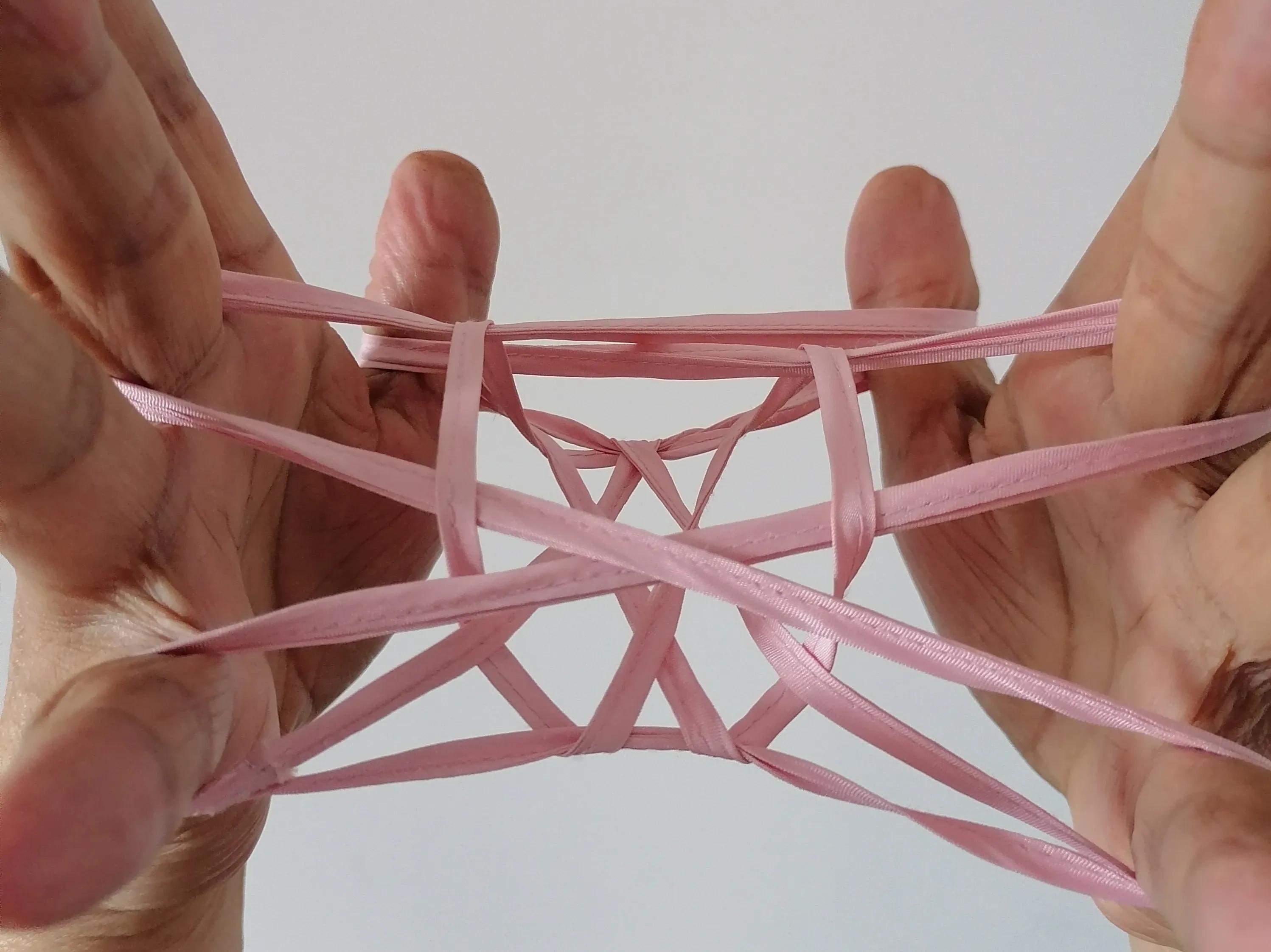 翻花绳游戏过程100字,两人玩的翻花绳游戏小技巧