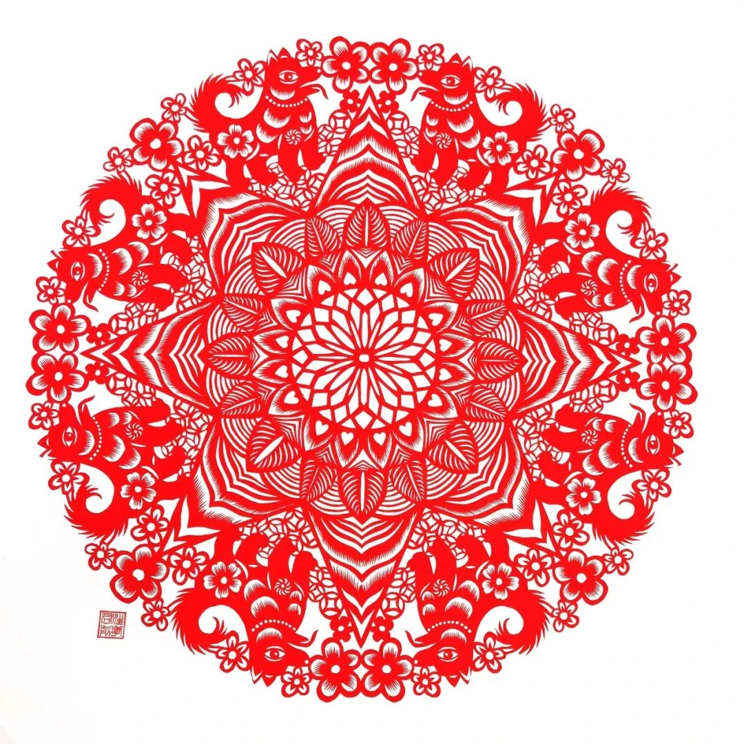 团花剪纸和剪纸团花有什么不一样,团花剪纸是不对称的剪纸吗