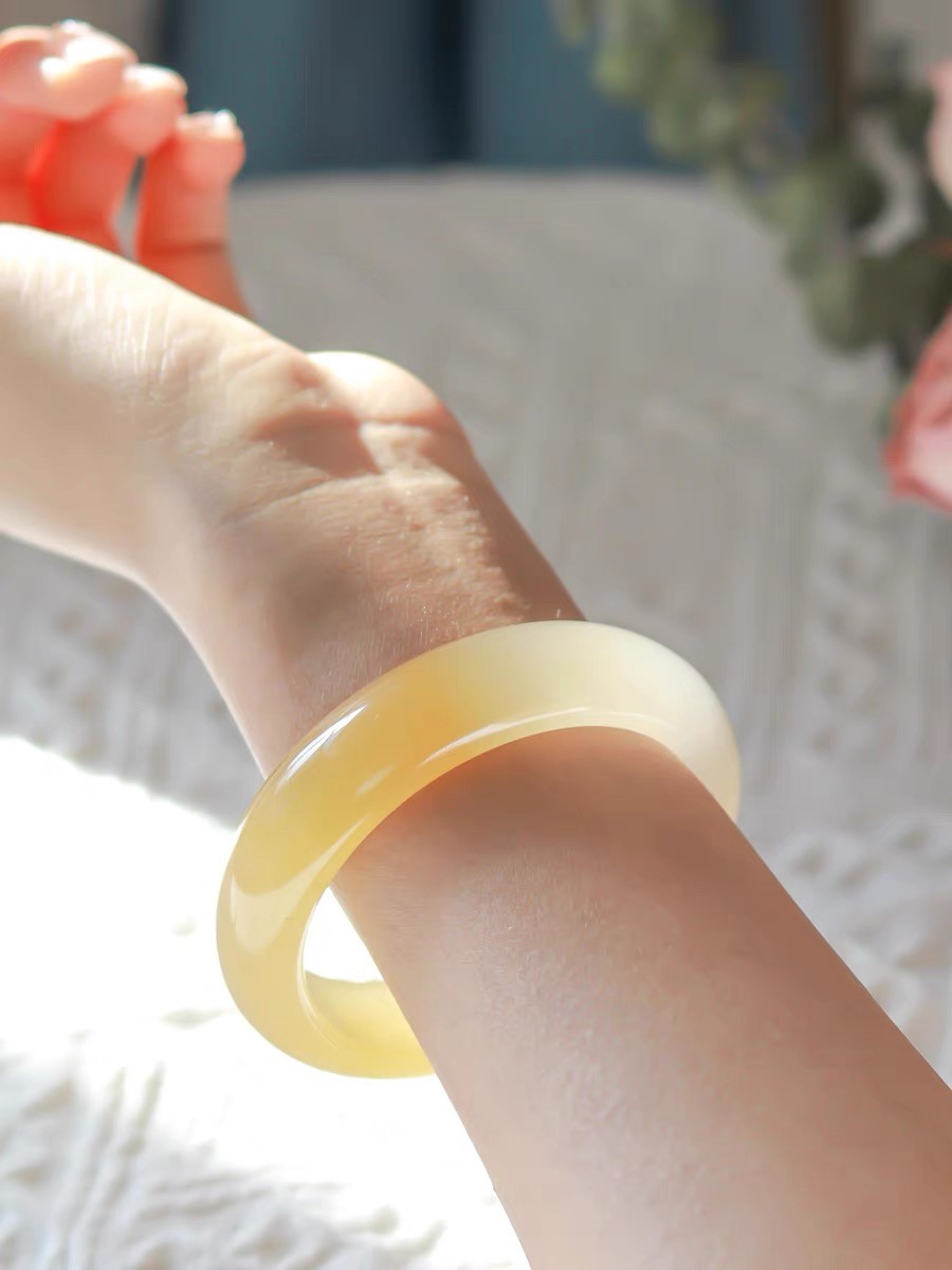 黄龙玉手镯有棉絮吗,黄龙玉裂后的棉絮