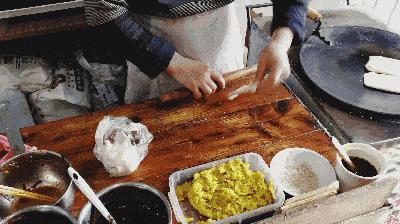 南充锅盔灌凉粉多少钱一个,南充最正宗锅盔夹凉粉李家镇