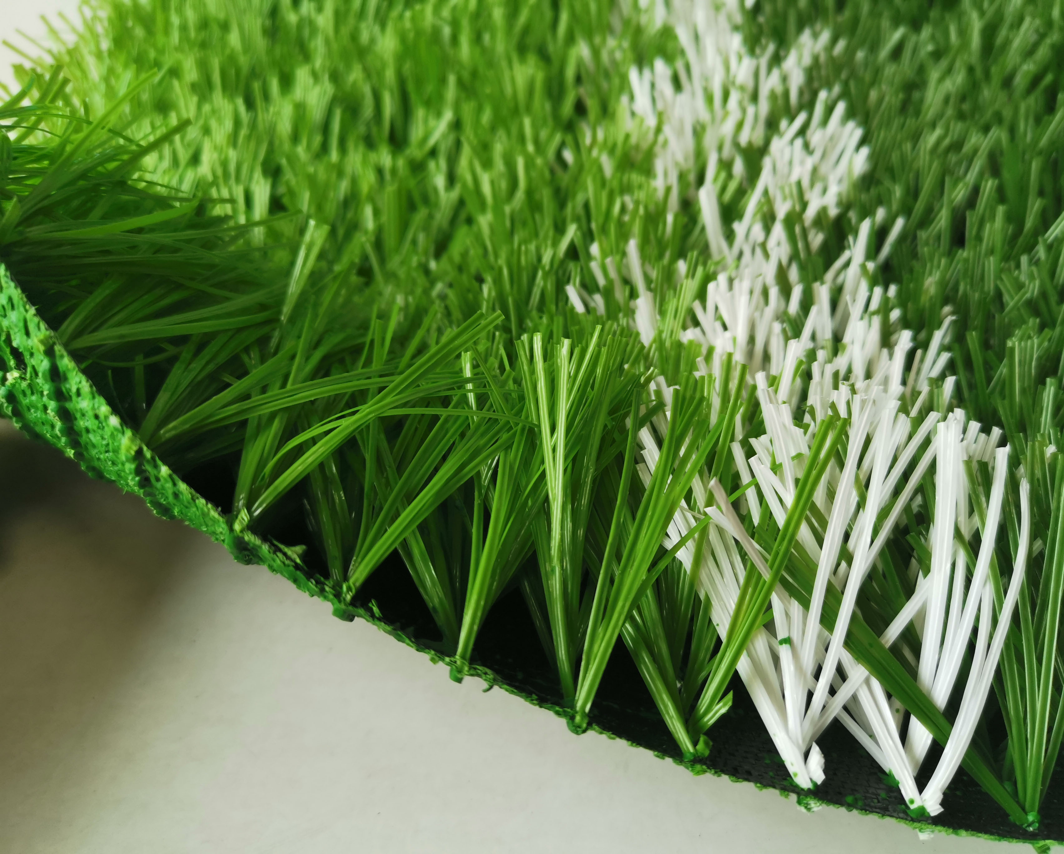 十堰人造草皮足球场多少钱,8人制人造草皮足球场造价